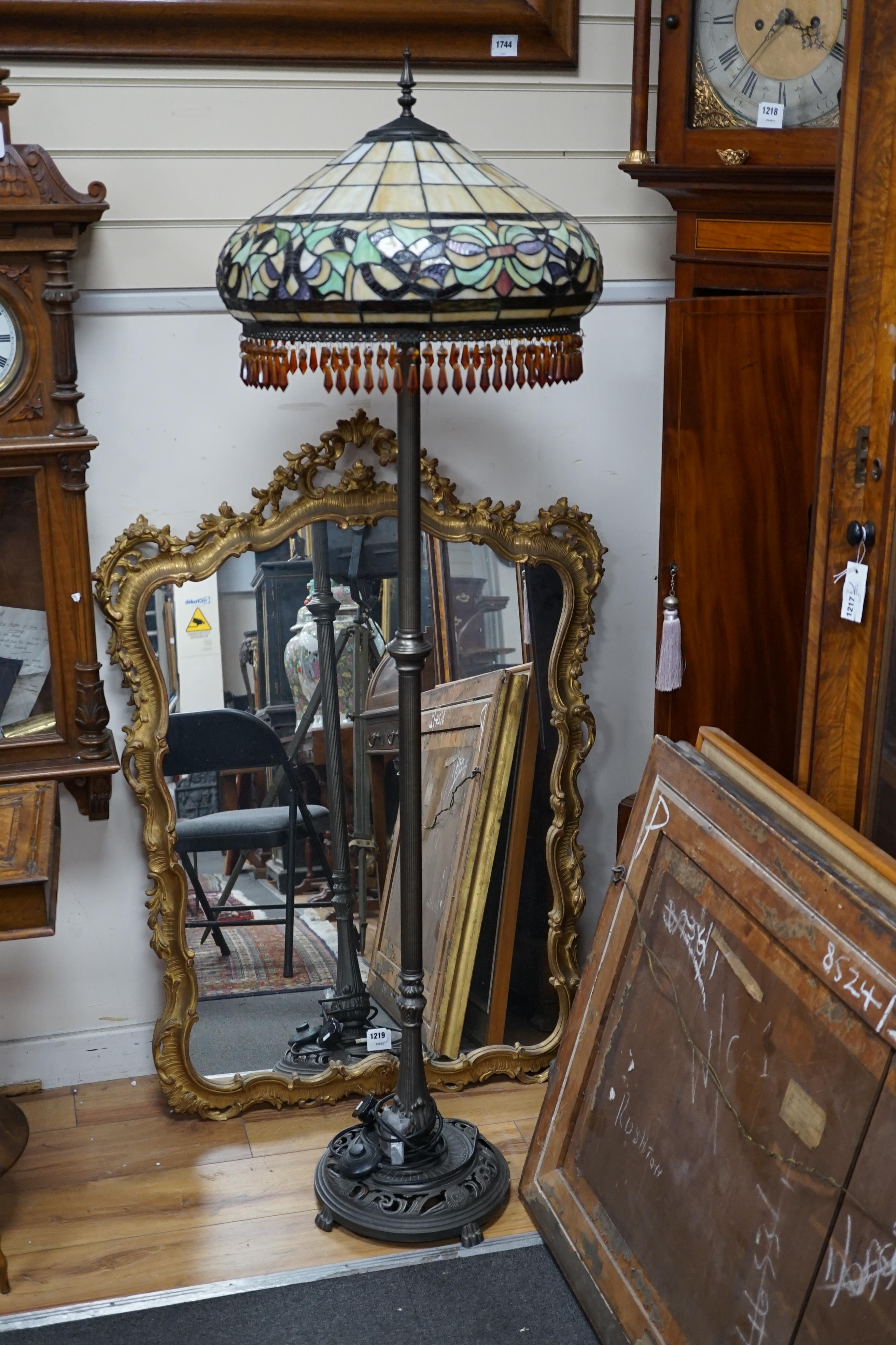 A Tiffany style leaded glass and bronzed metal lamp standard, height 164cm